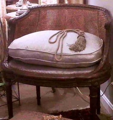 Pretty French style occasional chair.  Down cushion, newly upholstered.  Canning front and back.  Please call for pricing.