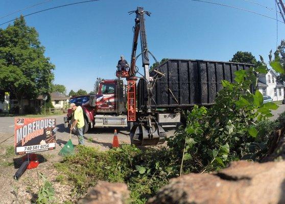 Cleaning up with Brush/Debris Truck