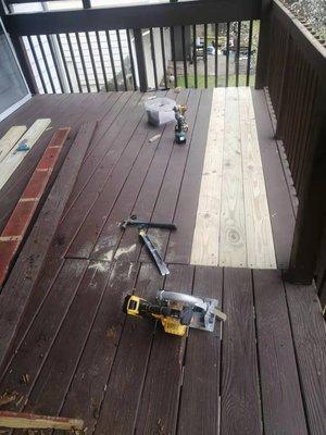 Rotted wood deck before repair and painting