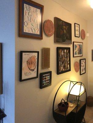 My new purchases on my gallery wall. Lower left, center and right.