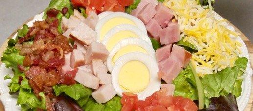 Chef Salad
Turkey, Ham, Bacon, Boiled Egg, Tomatoes & Cheese 
on Mixed Greens