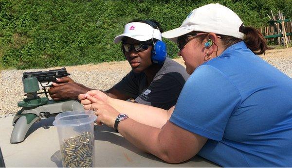 AFT Instructor Susan Connell discussing fine points in technique with a customer