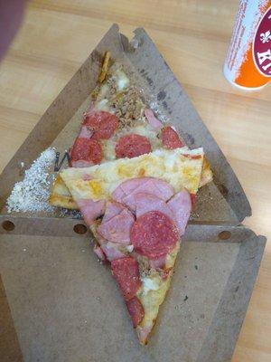 Stuffed meat lovers slice of pizza for $5.65+tax.  Here it is opened up.