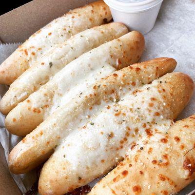 Cheesy Breadsticks (6) with marinara dipping sauce from Mel's Pizzeria, Kittanning PA