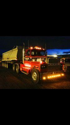 Our quad axle dump and heavy tractors can move anything you need