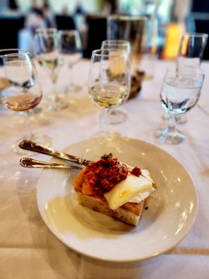 Focaccia with peach jam, sundried tomato tapenade, and brie