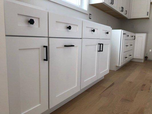 Kitchen remodel. Design, hardwood flooring, and cupboard installation by Urban Floors.