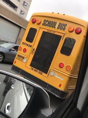 Bus number and plate . The driver was older white man w/ grey hair. At 2pm , probably on his way to pick up kids at a school near 233rd.