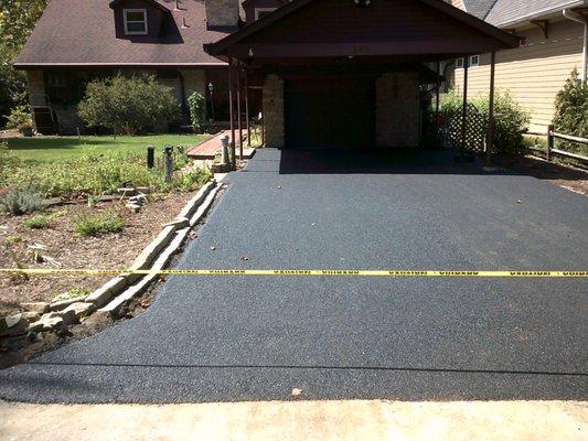 Pullins installed the asphalt perfectly smoothly, and with care not to damage things near the driveway.