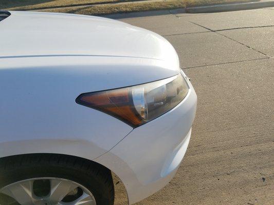 One grimy swipe across the headlight. Pathetic detailing!