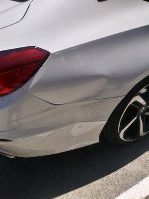 Rear quarter panel damage on a 2018 Honda accord