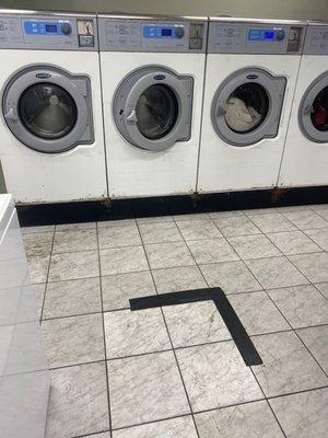 Old washers and a dirty floor