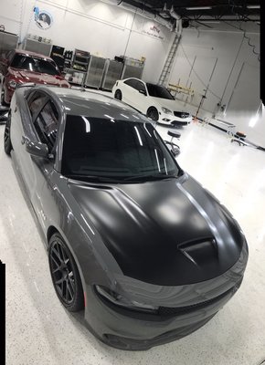 Satin black hood wrap on Dodge Charger