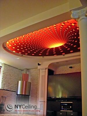 Fabric seamless stretch ceiling with 3D print "Dark hole" and LED strip lighting. See more at nyceiling.com