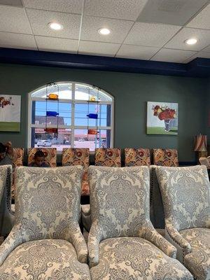 Love the dining room chairs that match nothing and further clutter the waiting room.