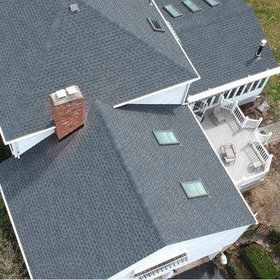 Loving the new roof installation on this residential property.