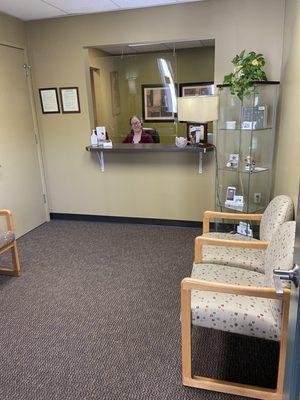 Our waiting room and front desk, as seen from the door.