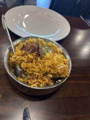 Chicken biryani - very good.  Medium spice but still lil kick