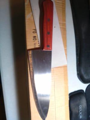 $16 chef knife, sharpened as I waited