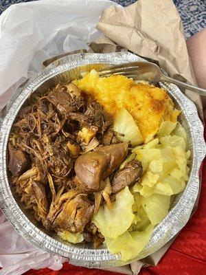 Packed to go bowl with chicken, rice, Steam Cabbage, and Macaroni and Cheese