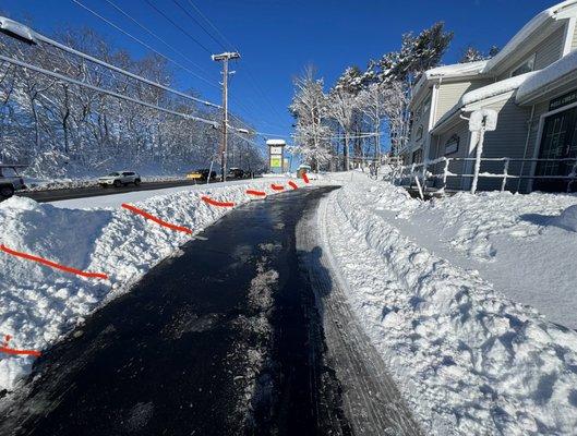 After a revisit, only one pass was made leaving all the parking spots (in red) unplowed.