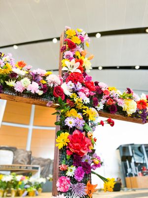 The congregation flowers the cross each Easter!