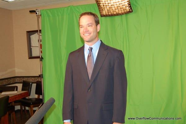 For what it's worth, Overflow Communications can also create a set of sorts in a client's office, making use of a green screen.