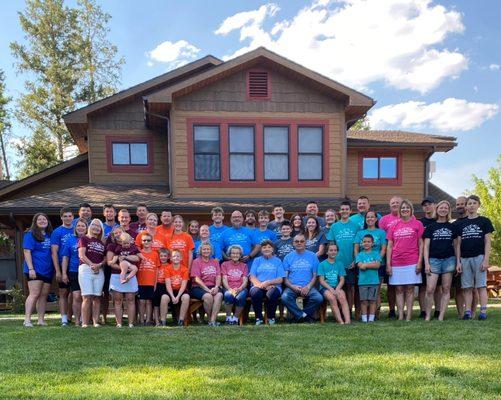 All 43 of us with the Flower Moon cabin in the background!