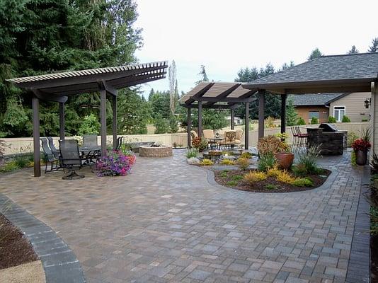 A large paver patio is where the outside room entertaining begins.