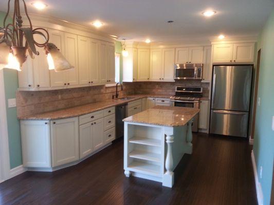 Kraftmaid Cabinets done in Harrington door Style, Maple Wood, Finished in a Canvas Paint.