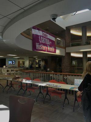 Pay attention to student-made signage and who it features. LGBTQIA+ inclusivity was visible on signs at Colorado College such as this one.