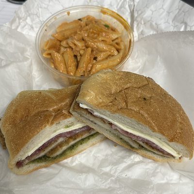 Chicken Cutlet on a Roll w/ Fresh Mozzarella, Prosciutto, Pesto & side of Penne alla Vodka $12