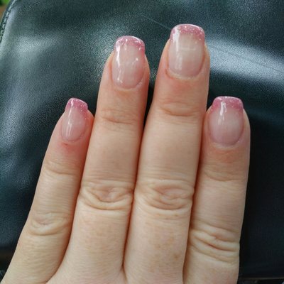 Sparkly, light pink powder colored nails. They call it dipping.  As long as I never have painted Nails again. I'm thrilled.