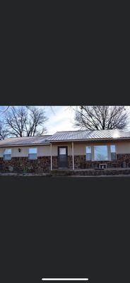 Beautiful rock home with new energy efficient replacement windows