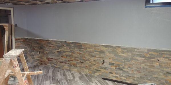 Basement floor with stone walls