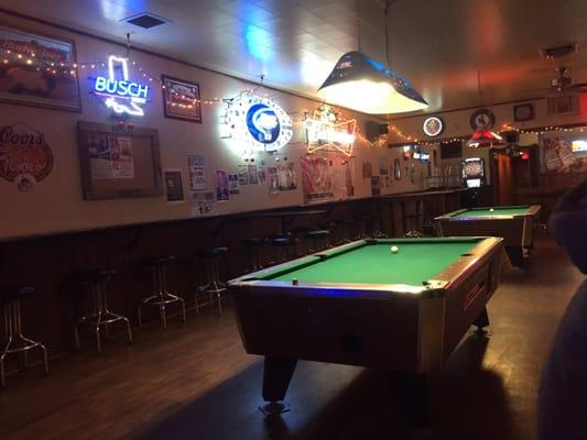 The rainbow has multiple pool tables.