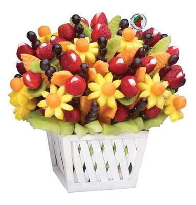 The perfect centerpiece for your special occasion. Our Majestic Floral Fruit Design serves 30-45