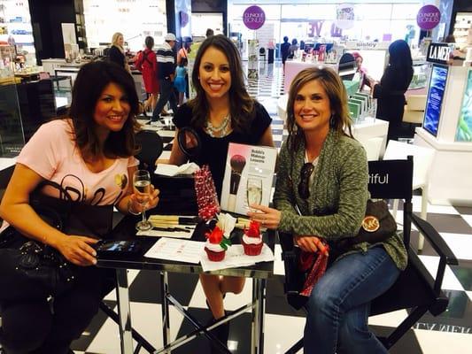 Some of our lovely clients enjoying complimentary champagne and red velvet cupcakes during our Kiss and Makeup event!