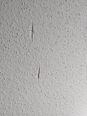 Damaged walls inside my apartment.