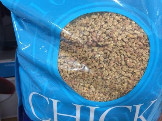 Discolored, expired, Manna Pro, chicken feed on shelves