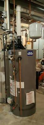 75 gallon Ruud power vent water heater with reciprocating pump and expansion tank