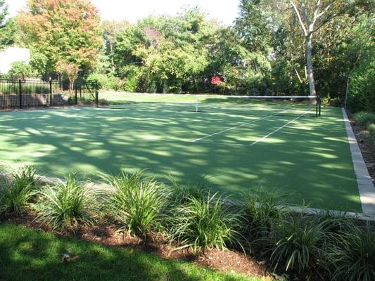 A SWG Synthetic Grass Tennis Court Installation.  