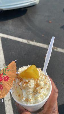 Fancy Pina Colada with coconut shavings on top.