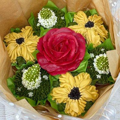 Floral cupcake bouquet. 7 beautifully decorated edible cupcakes.