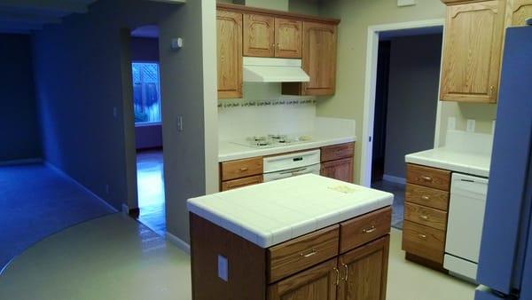 Old kitchen - showing wall and island that were removed by S & Y.