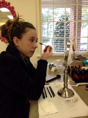 My daughter getting a makeup application lesson with Kim.