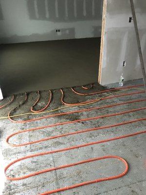 Mud job over a 4 Zone radiant heat system.