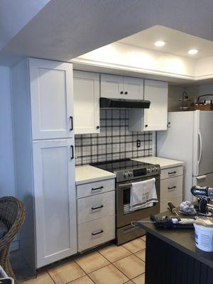 New cabinets, backsplash and lights.