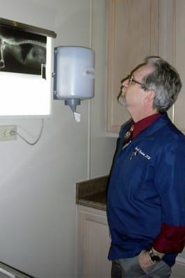 Dr. Mark Hackett viewing an x-ray