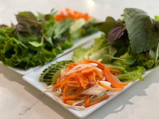 Veggies that are served with the egg rolls & sugar cane shrimp